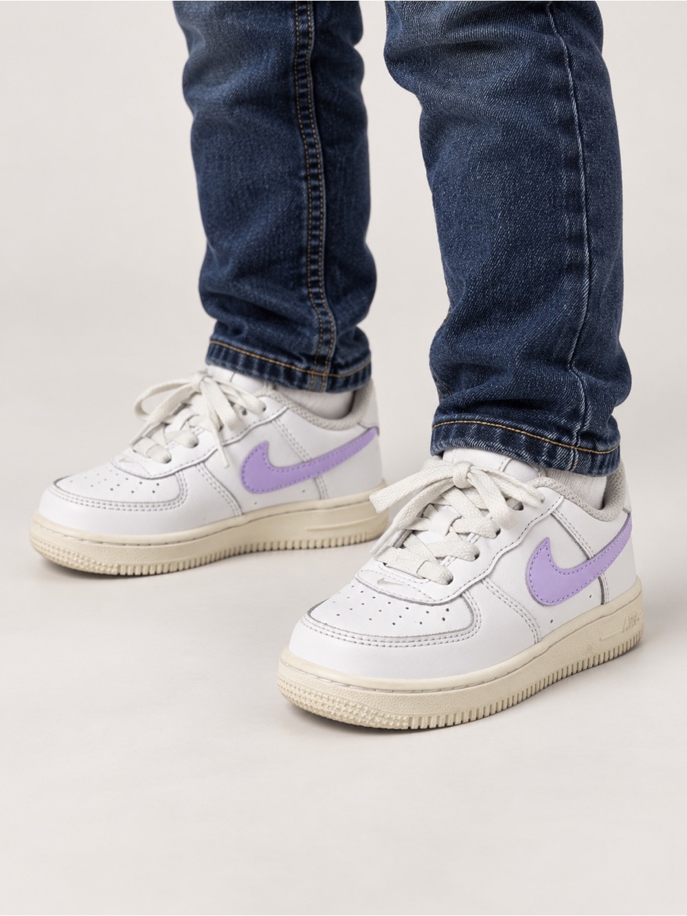Nike Kids White Sneakers with Lavender Swoosh